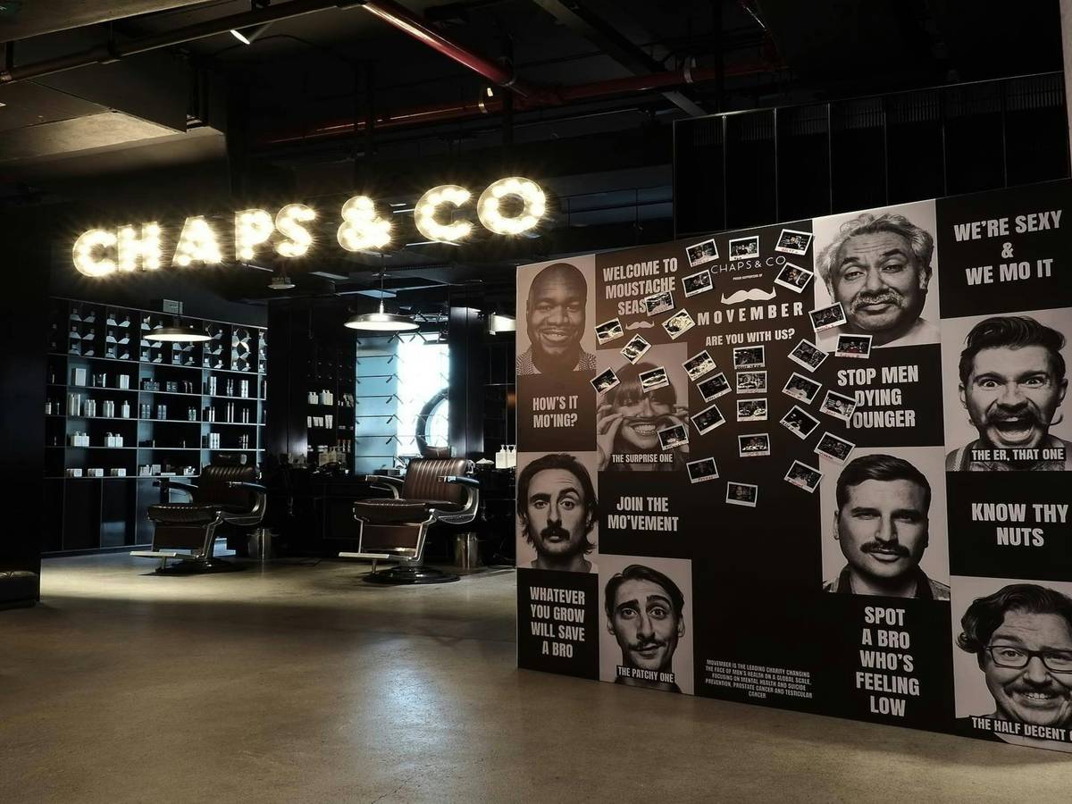 Close-up photo showing signs of dry beard including flakes and split ends.